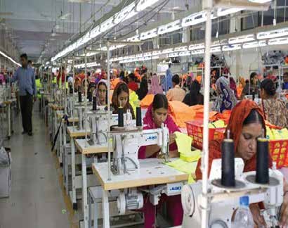 Photo (from the pamphlet, not a data chart): a textile factory production floor in Pakistan.