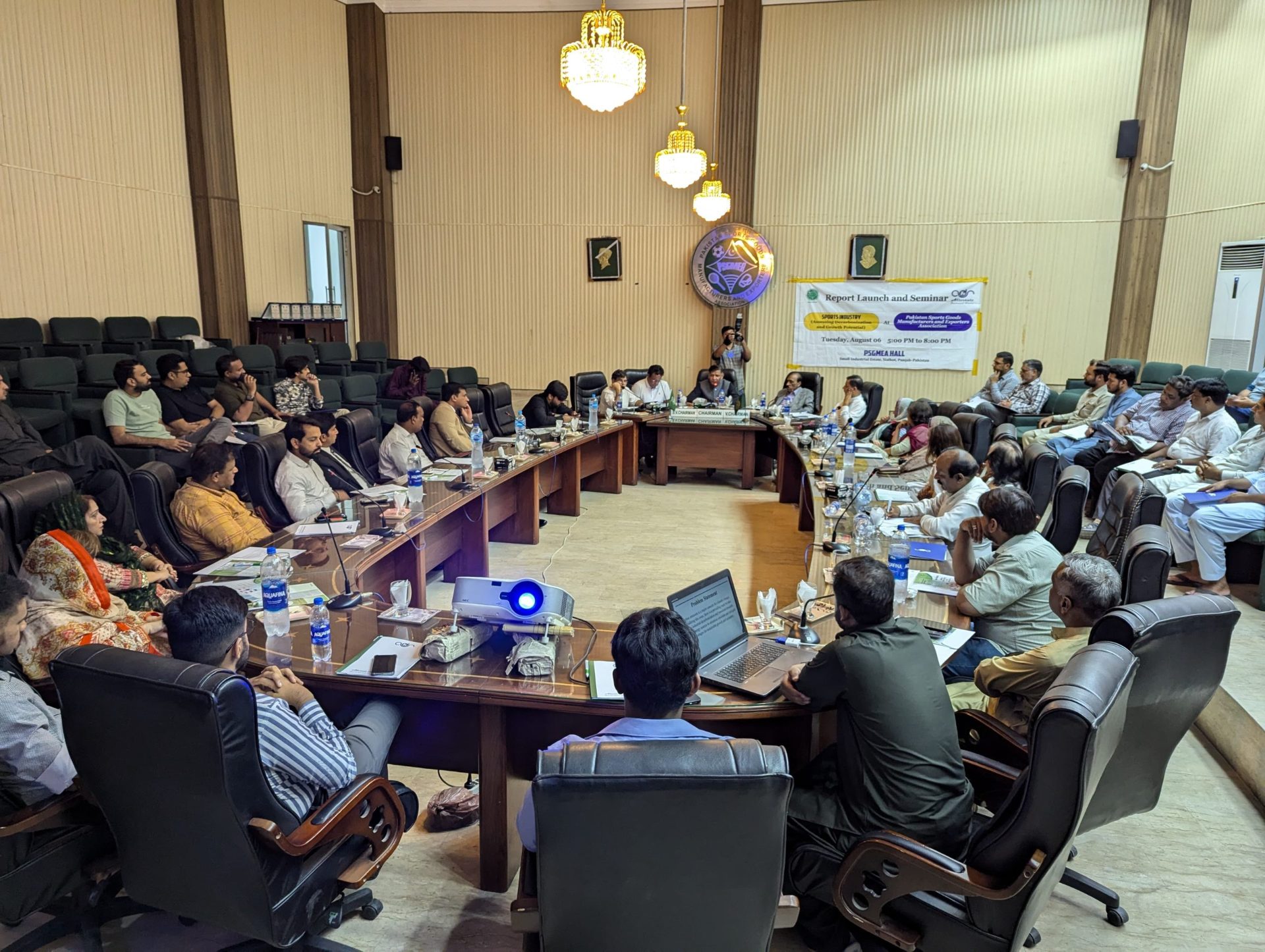 Full-hall view of the Sports Industry Decarbonization report launch and seminar, PSGMEA Hall, Sialkot.