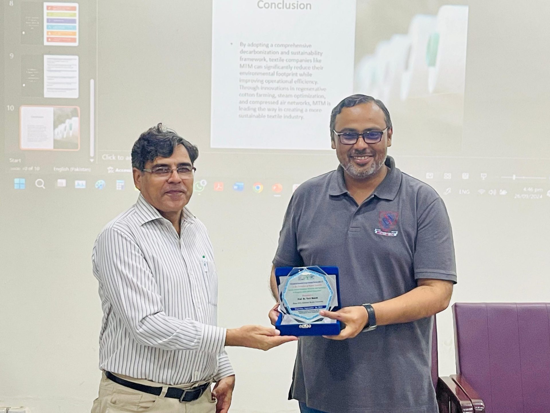 A token of appreciation presented to Prof. Dr. Yasir Rawal, Dean HTC, National Textile University, at the study launch event.